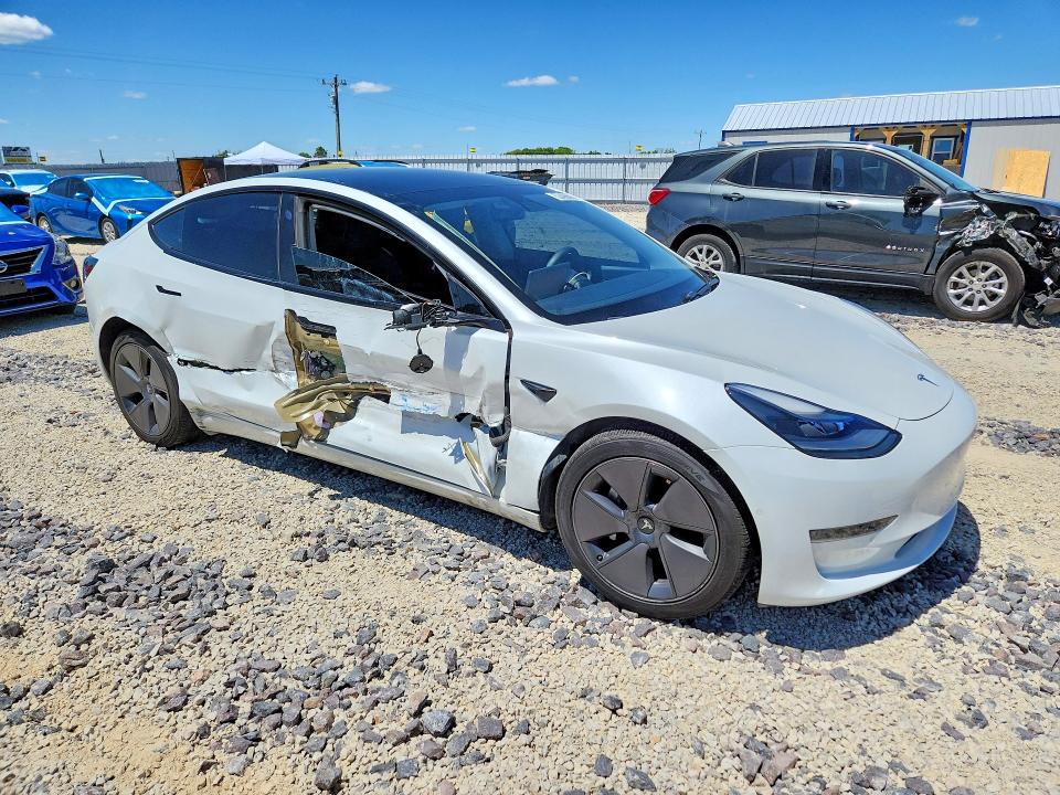 2021 Tesla VIN 5YJ3E1EA0MF915329 COPART salvage auction — SIDE, MO - SALVAGE CERTIFICATE OF TITLE, sold $6,100 on 2026-07-29 (photo 4)