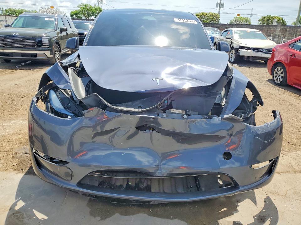 2023 Tesla Model y VIN 7SAYGDEE5PF629696 COPART salvage auction — FRONT END, FL - CERTIFICATE OF TITLE, sold $7,200 on 2026-07-16 (photo 5)
