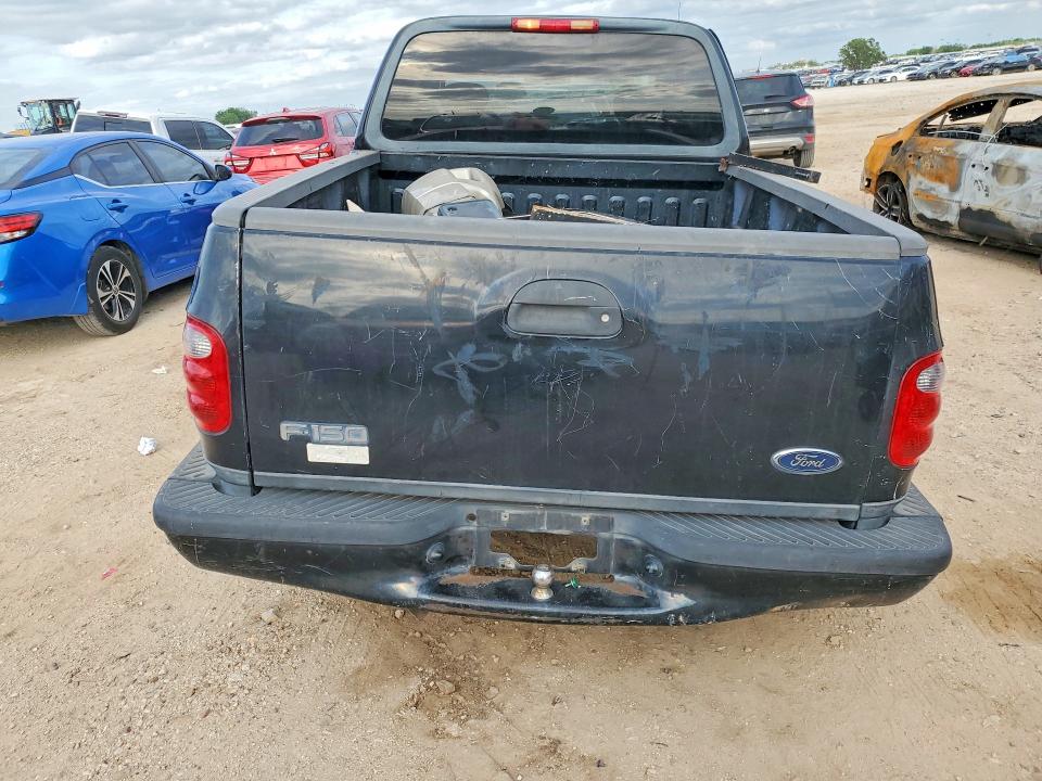 2003 Ford F-150 lightning VIN 1FTRX07W33KD10259 COPART salvage auction — SIDE, Tx - Salvage Vehicle Title, sold $450 on 2026-07-02 (photo 6)