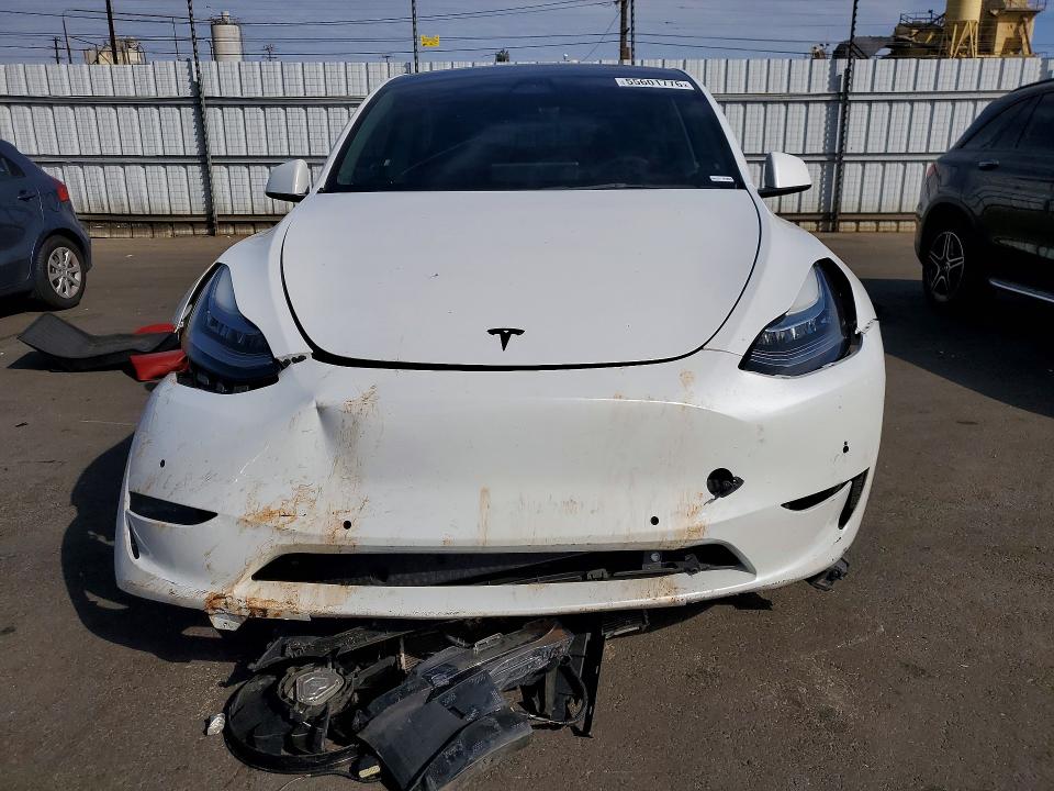 2022 Tesla Model y VIN 7SAYGDEE5NF317505 COPART salvage auction — FRONT END, Ca - Salvage Certificate, sold $8,700 on 2026-07-15 (photo 5)