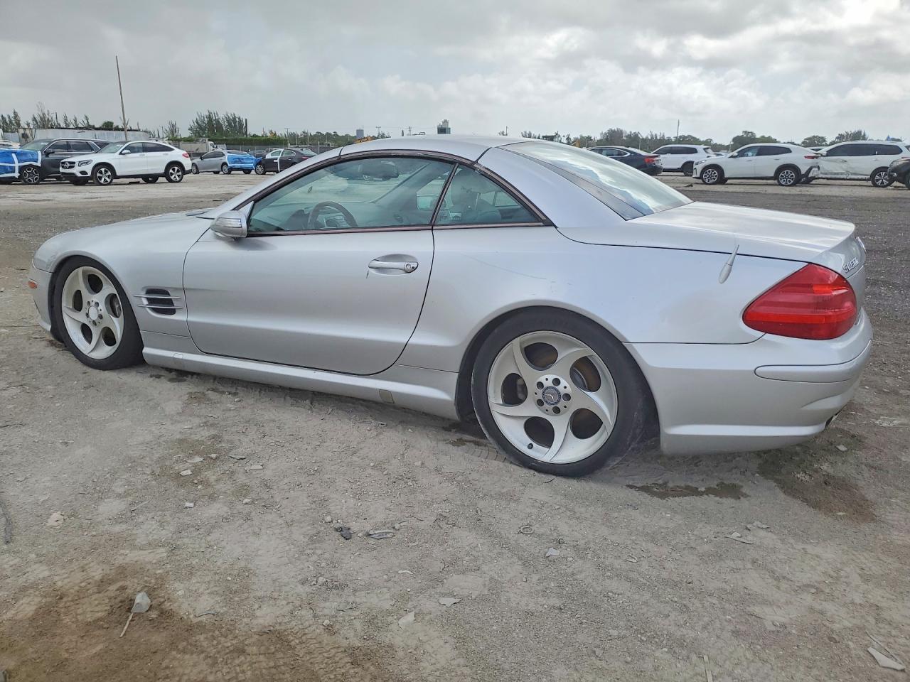 2004 Mercedes-Benz SL-Class VIN WDBSK75F04F065151 COPART salvage auction — Minor Dent/Scratches, FL - CERT OF TITLE-REBUILT, sold $400 on 2026-06-30 (photo 2)