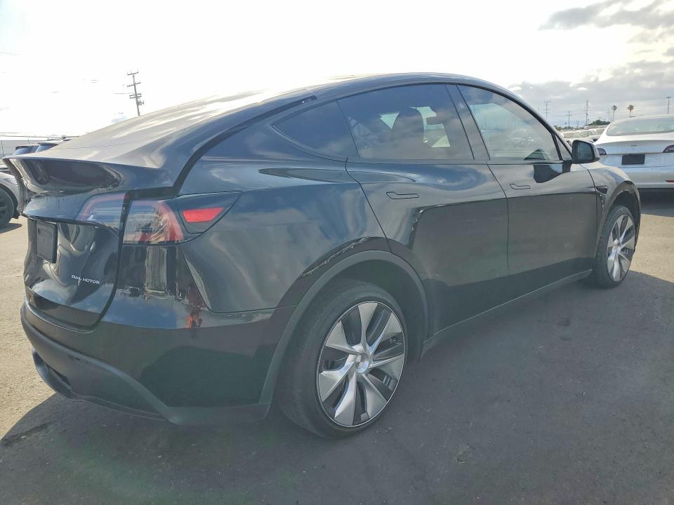 2023 Tesla Model y VIN 7SAYGDEE6PA208714 COPART salvage auction — REAR END, Ca - Salvage Certificate, sold $11,700 on 2026-07-20 (photo 3)