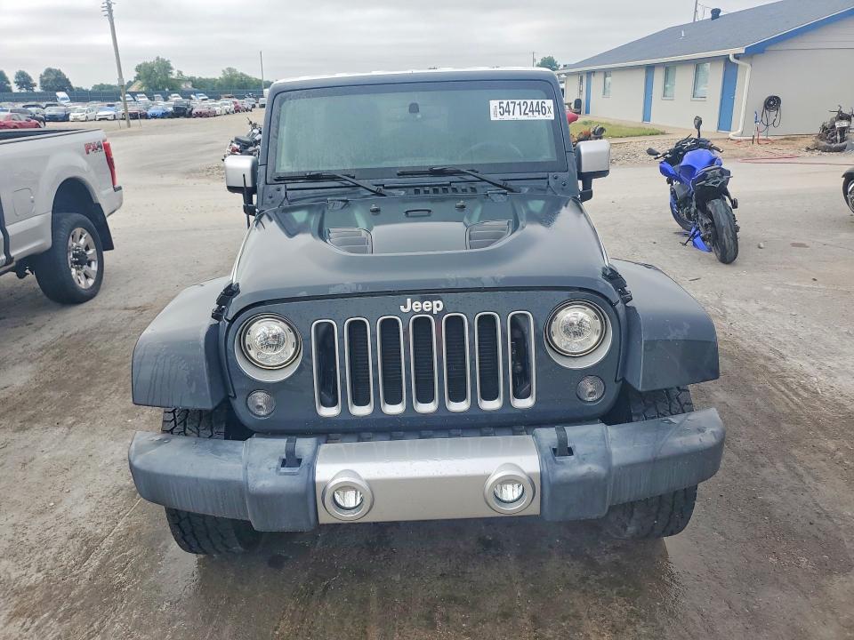 2017 Jeep Wrangler unlimited VIN 1C4BJWEG3HL684485 COPART salvage auction — WATER/FLOOD, Fl - Cert Of Title-Slvg Rebld Flood, sold $9,700 on 2026-07-27 (photo 5)