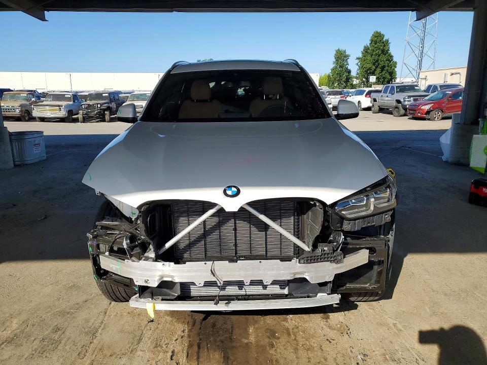 2024 BMW VIN WBX57DP05RN301641 COPART salvage auction — FRONT END, Ca - Salvage Certificate, sold $21,100 on 2026-07-07 (photo 5)