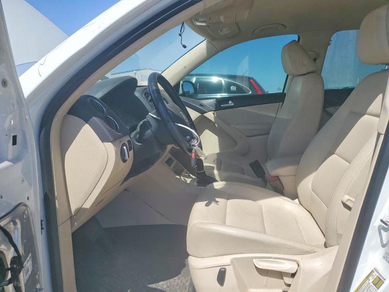 2016 Volkswagen Tiguan VIN WVGAV7AX5GW530705 COPART salvage auction — SIDE, Tx - Salvage Vehicle Title, sold $2,100 on 2026-07-07 (photo 7)