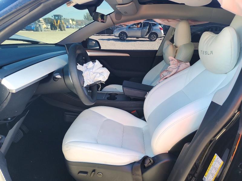 2024 Tesla Model y VIN 7SAYGDED7RF095045 COPART salvage auction — ALL OVER, Fl - Certificate Of Destruction, sold $3,150 on 2026-07-31 (photo 7)