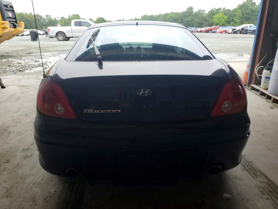 2004 Hyundai Tiburon VIN KMHHM65D04U107498 COPART salvage auction — SIDE, Nc - Salvage Certificate Of Title, sold $200 on 2026-07-08 (photo 6)