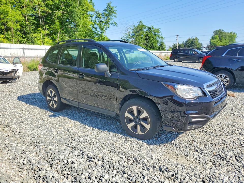 2018 Subaru Forester VIN JF2SJABC9JH615699 COPART salvage auction — MINOR DENT/SCRATCHES, NC - SALVAGE CERTIFICATE OF TITLE, sold $5,800 on 2026-07-29 (photo 4)