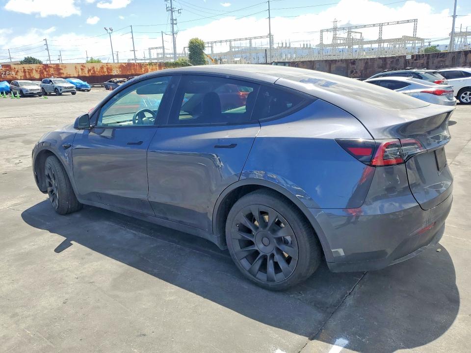 2023 Tesla Model y VIN 7SAYGDEE8PA113412 COPART salvage auction — MINOR DENT/SCRATCHES, Ca - Salvage Certificate, sold $14,100 on 2026-07-15 (photo 2)