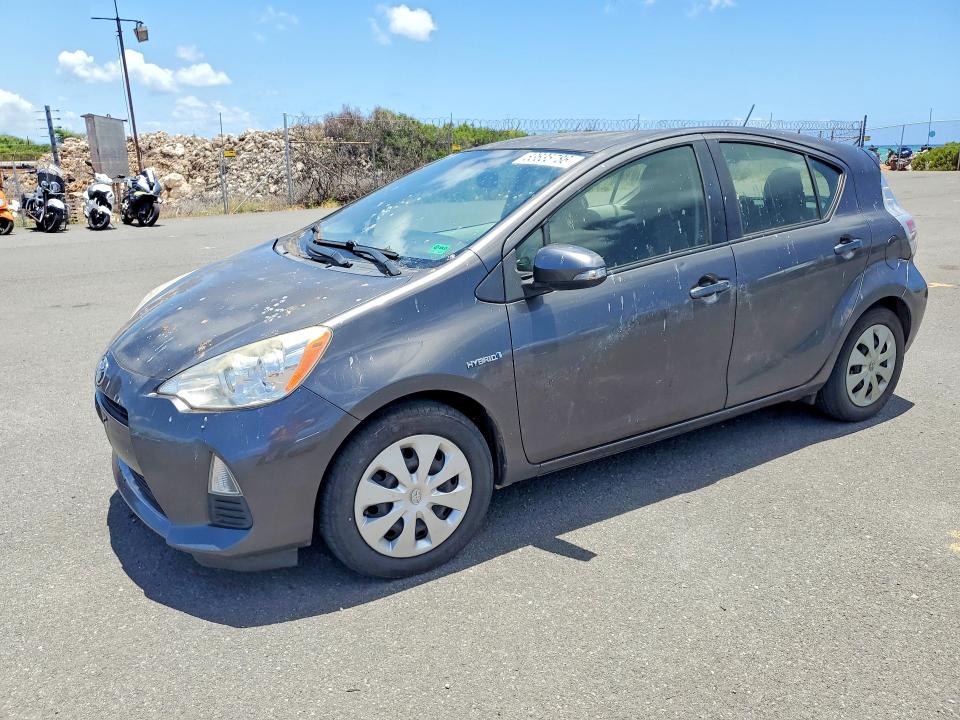 2014 Toyota Prius c VIN JTDKDTB3XE1570143 COPART salvage auction — MINOR DENT/SCRATCHES, HI - CERTIFICATE OF TITLE, sold $90 on 2026-07-27 (photo 1)