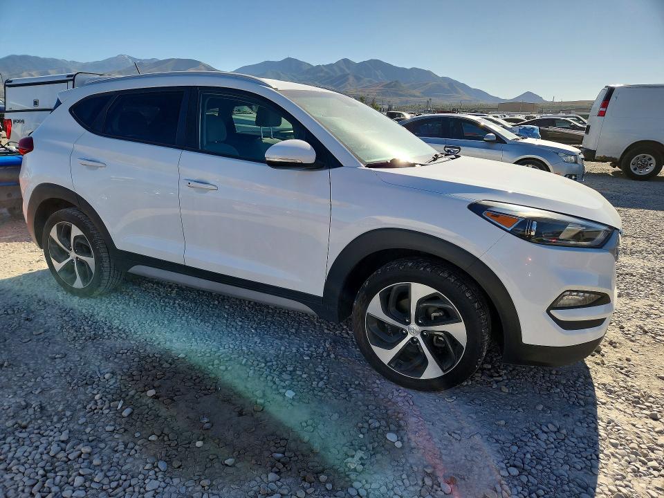2017 Hyundai Tucson VIN KM8J3CA25HU369594 COPART salvage auction — MINOR DENT/SCRATCHES, Ut - Certificate Of Title (P), sold $3,350 on 2026-07-07 (photo 4)