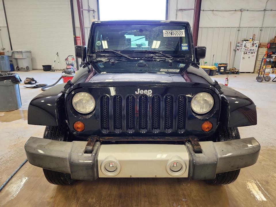 2010 Jeep Wrangler / VIN 1J4AA5D19AL158512 COPART salvage auction — MINOR DENT/SCRATCHES, Tx - Certificate Of Title, sold $3,200 on 2026-07-07 (photo 5)
