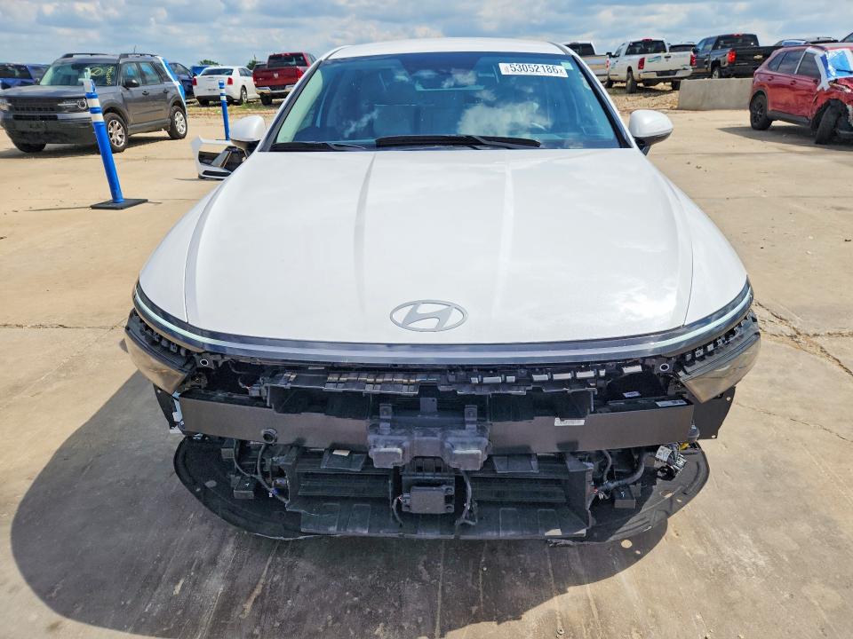 2025 Hyundai Sonata VIN KMHL34JJ0SA127472 COPART salvage auction — SIDE, Tx - Salvage Vehicle Title, sold $10,200 on 2026-07-16 (photo 5)