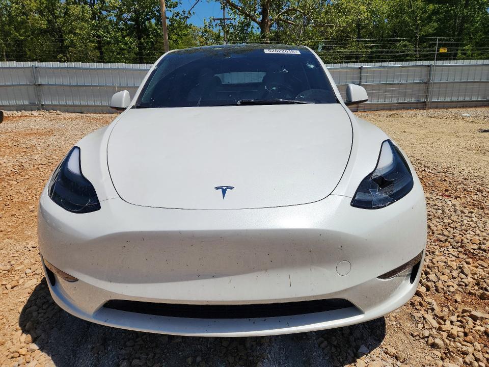 2024 Tesla Model y VIN 7SAYGDEE9RF160566 COPART salvage auction — HAIL, Salvage Title, sold $2,050 on 2026-07-29 (photo 5)