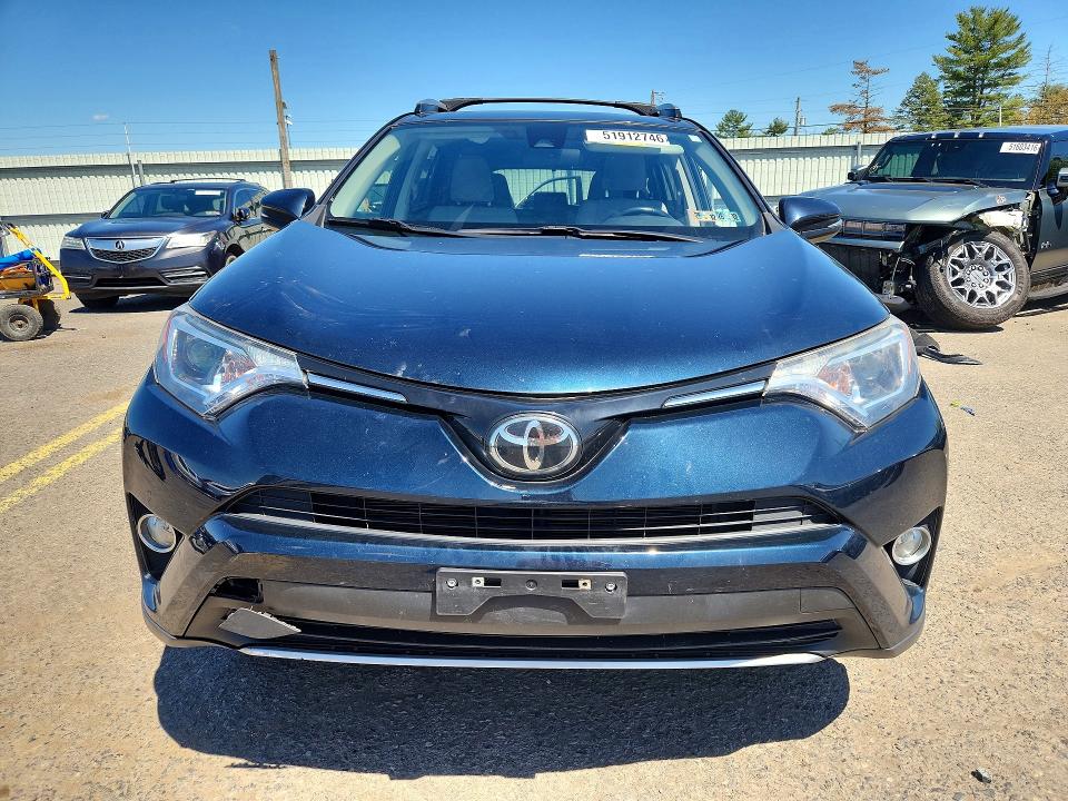 2018 Toyota Rav4 VIN JTMRFREV6JJ725323 COPART salvage auction — REAR END, PA - CERTIFICATE OF SALVAGE, sold $6,700 on 2026-07-10 (photo 5)