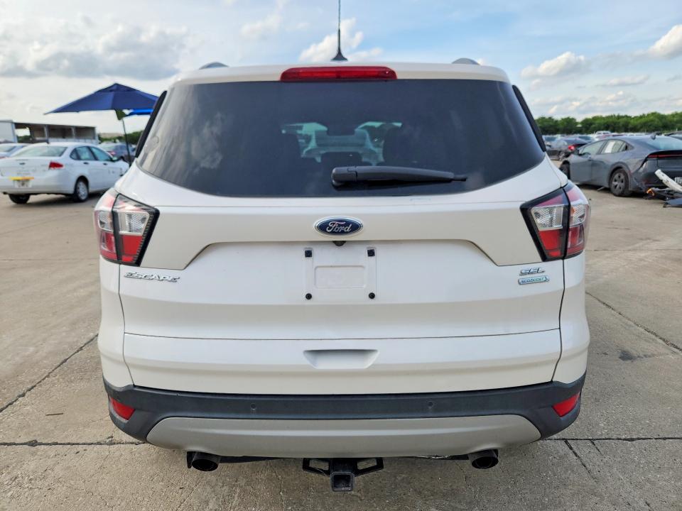 2018 Ford Escape VIN 1FMCU0HD2JUD20516 COPART salvage auction — HAIL, Tx - Certificate Of Title, sold $5,000 on 2026-07-09 (photo 6)