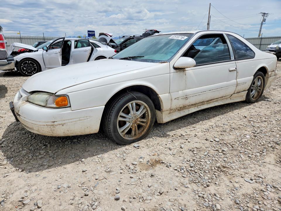 1997 Ford Thunderbird VIN 1FALP62W9VH148577 COPART salvage auction — MECHANICAL, Ut - Certificate Of Title, sold $650 on 2026-07-09 (photo 1)
