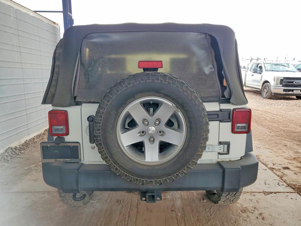 2010 Jeep Wrangler / VIN 1J4HA6D10AL213966 COPART salvage auction — MINOR DENT/SCRATCHES, Az - Cert Of Title - Salvage, sold $4,400 on 2026-07-02 (photo 6)