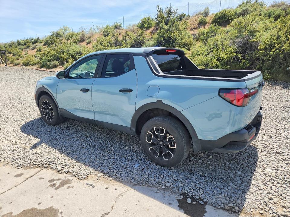 2024 Hyundai Santa cruz VIN 5NTJBDDE6RH110497 COPART salvage auction — SIDE, Nv - Salvage Title, sold $7,500 on 2026-07-09 (photo 2)