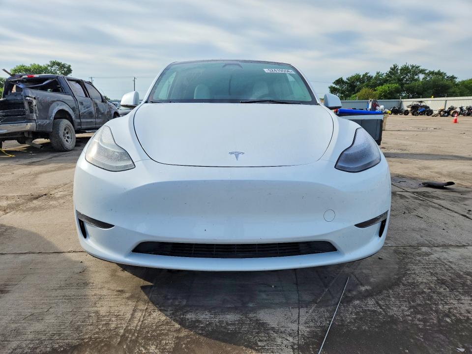 2023 Tesla VIN 7SAYGDEE1PF871692 COPART salvage auction — UNDERCARRIAGE, Tx - Certificate Of Title, sold $225 on 2026-07-09 (photo 5)