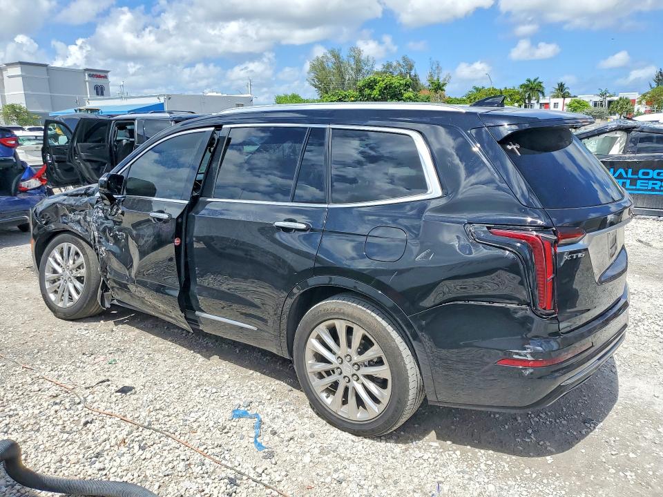 2021 Cadillac Xt6 VIN 1GYKPCRS0MZ206618 COPART salvage auction — SIDE, Fl - Cert Of Title Slvg Rebuildable, sold $8,600 on 2026-08-21 (photo 2)
