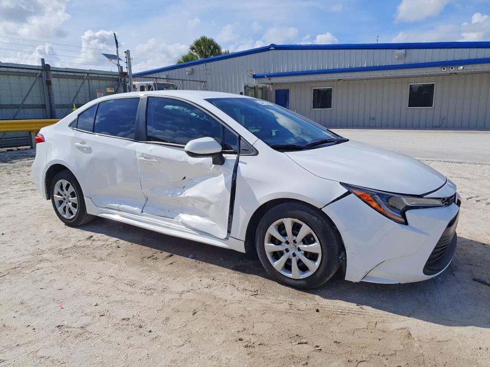 2023 Toyota Corolla VIN 5YFB4MDE8PP034925 COPART salvage auction — SIDE, Fl - Certificate Of Destruction, sold $5,400 on 2026-07-15 (photo 4)