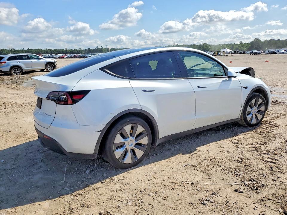 2023 Tesla VIN 7SAYGDEE0PA090319 COPART salvage auction — FRONT END, TX - SALVAGE VEHICLE TITLE, sold $8,500 on 2026-07-31 (photo 3)