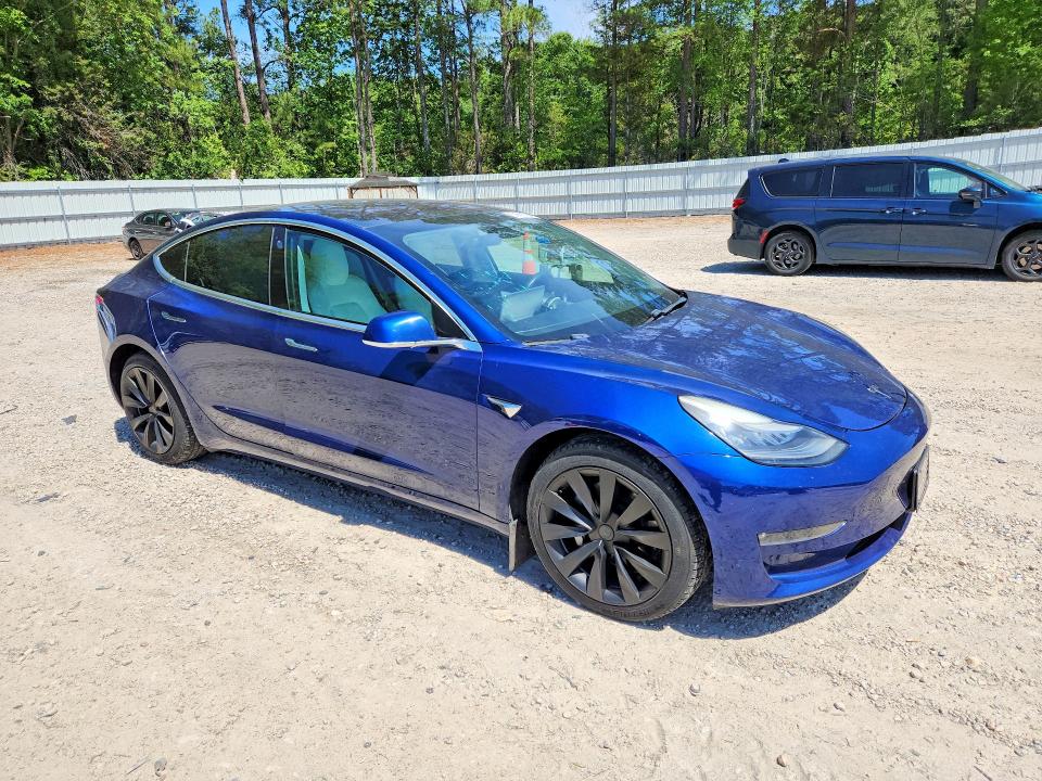 2018 Tesla Model 3 VIN 5YJ3E1EB8JF134689 COPART salvage auction — REAR END, Nc - Salvage Certificate Of Title, sold $750 on 2026-07-31 (photo 4)