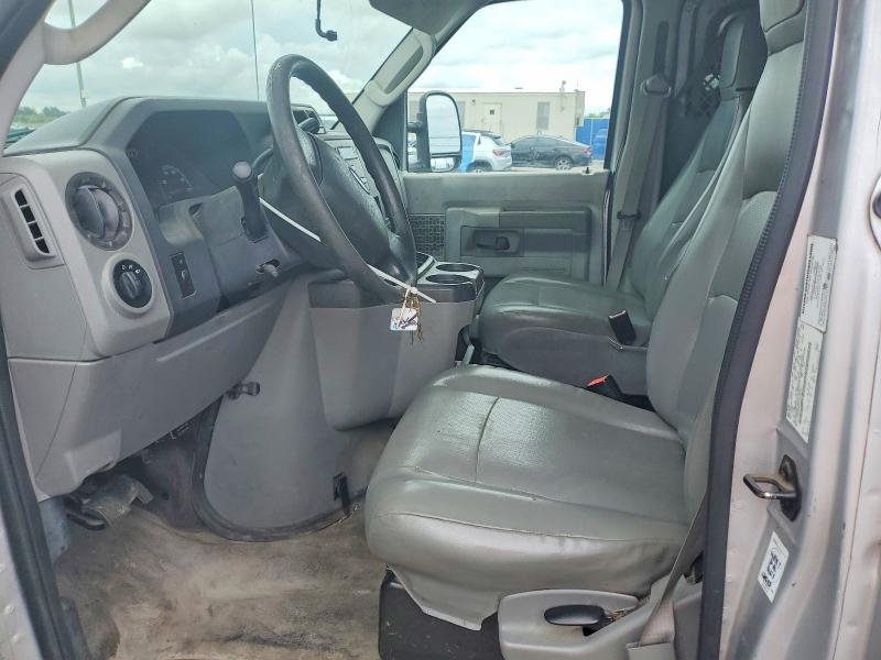 2014 Ford VIN 1FTNE1EW8EDB05699 COPART salvage auction — MINOR DENT/SCRATCHES, Fl - Certificate Of Title, sold $1,000 on 2026-07-09 (photo 7)