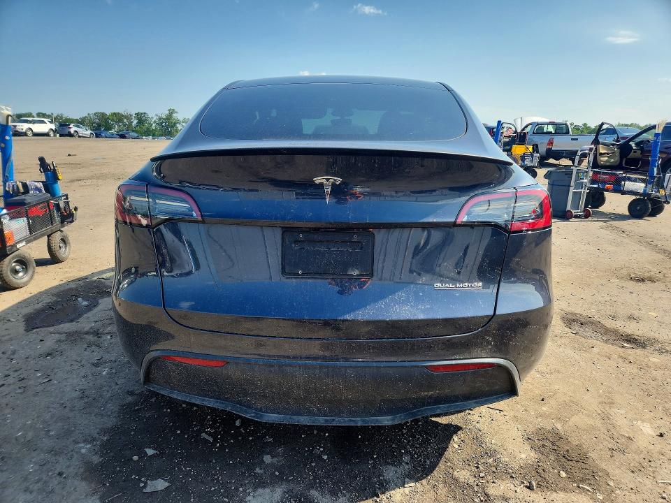 2025 Tesla Model y VIN 7SAYGDEF7SA350930 COPART salvage auction — SIDE, Va - Cert Of Title - Salvage, sold $11,800 on 2026-07-04 (photo 6)