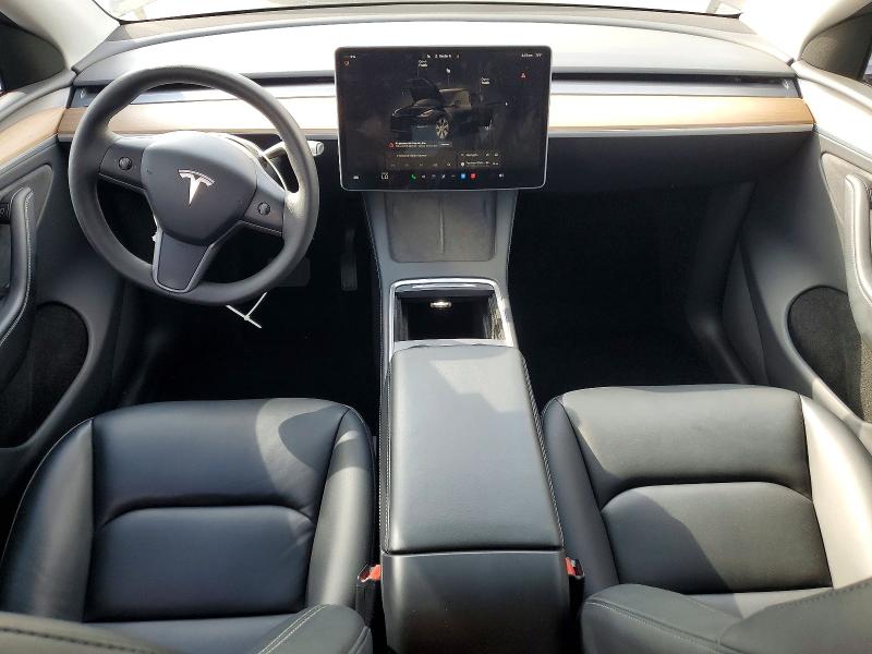 2023 Tesla Model y VIN 7SAYGDEE6PA208714 COPART salvage auction — REAR END, Ca - Salvage Certificate, sold $11,700 on 2026-07-20 (photo 8)