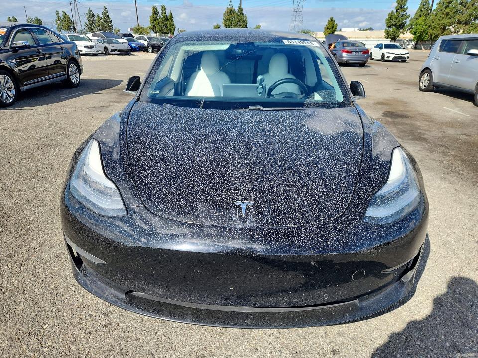 2020 Tesla Model 3 VIN 5YJ3E1EA2LF744095 COPART salvage auction — SIDE, Ca - Salvage Certificate, sold $5,600 on 2026-07-14 (photo 5)