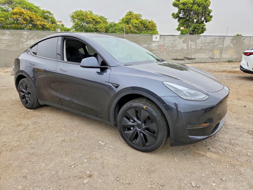 2025 Tesla Model y VIN 7SAYGDED0SF253523 COPART salvage auction — SIDE, Ca - Salvage Certificate, sold $13,600 on 2026-07-24 (photo 4)