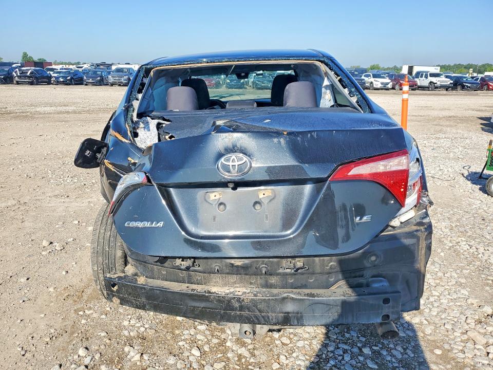 2018 Toyota Corolla VIN 5YFBURHE7JP840821 COPART salvage auction — ALL OVER, TX - CERTIFICATE OF TITLE, sold $1,250 on 2026-07-21 (photo 6)