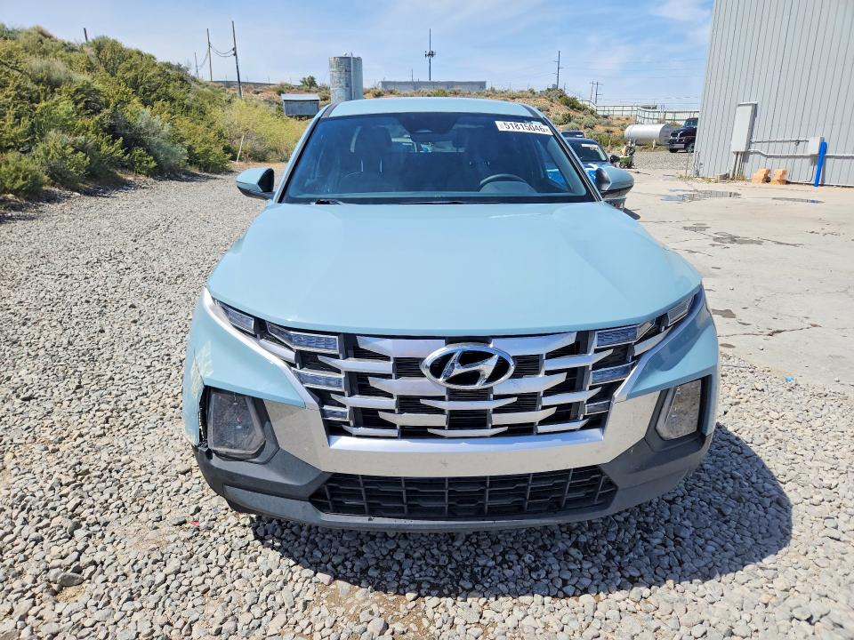 2024 Hyundai Santa cruz VIN 5NTJBDDE6RH110497 COPART salvage auction — SIDE, Nv - Salvage Title, sold $7,500 on 2026-07-09 (photo 5)