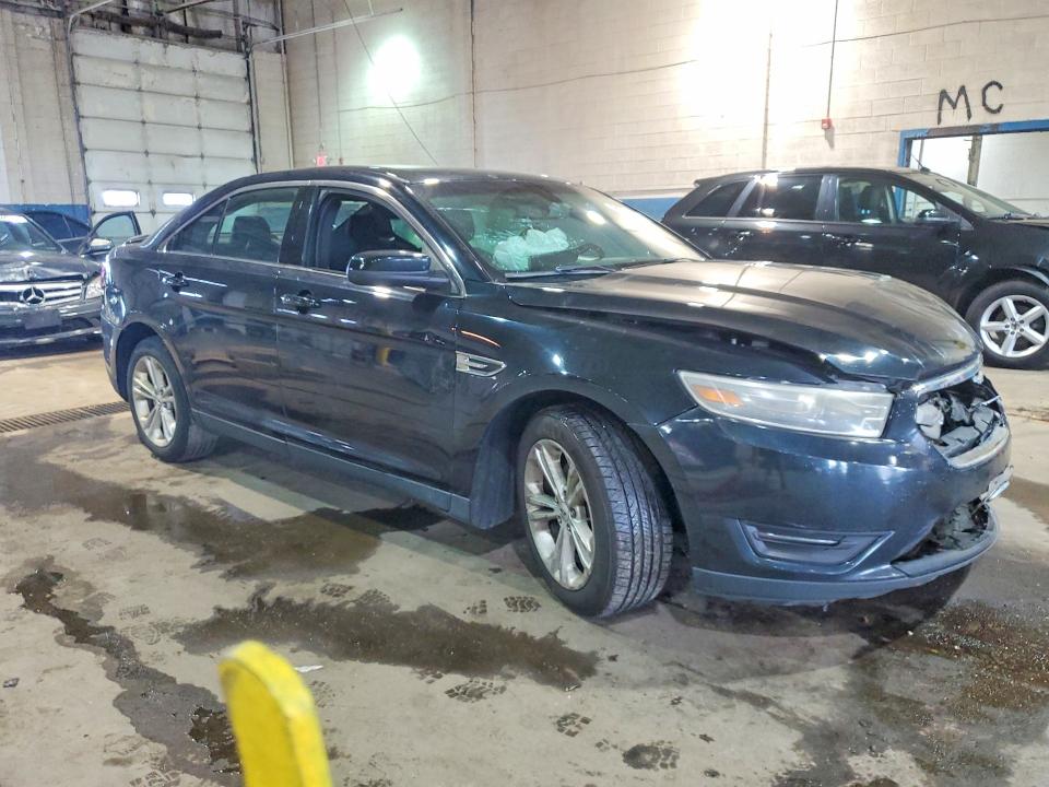 2015 Ford Taurus VIN 1FAHP2H88FG134796 COPART salvage auction — FRONT END, Mi - Cert Of Title-Rebuilt Salvage, sold $500 on 2026-07-02 (photo 4)