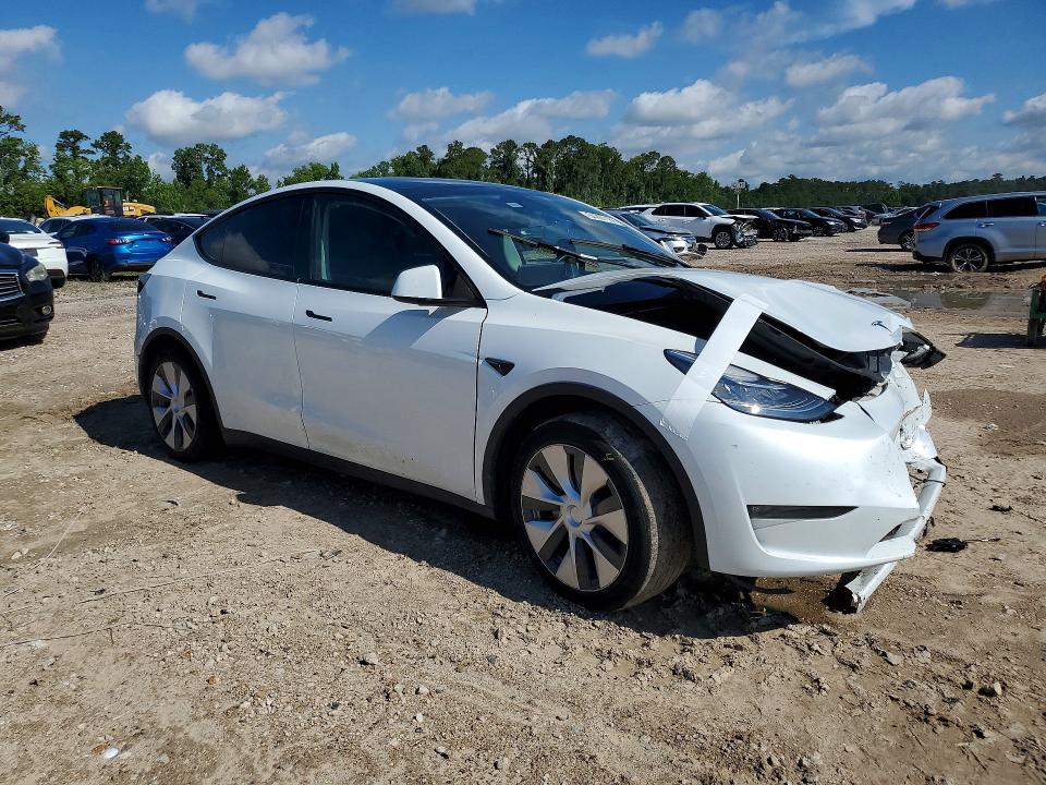 2023 Tesla VIN 7SAYGDEE0PA090319 COPART salvage auction — FRONT END, TX - SALVAGE VEHICLE TITLE, sold $8,500 on 2026-07-31 (photo 4)