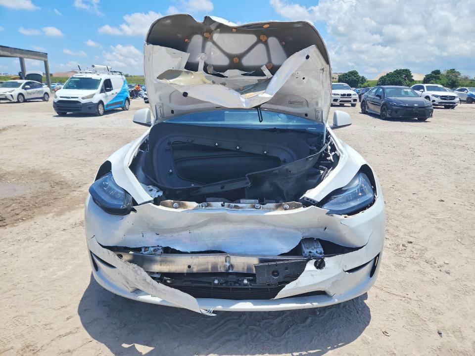2023 Tesla VIN 7SAYGDEE7PA147079 COPART salvage auction — FRONT END, FL - CERT OF TITLE SLVG REBUILDABLE, sold $11,200 on 2026-07-02 (photo 5)