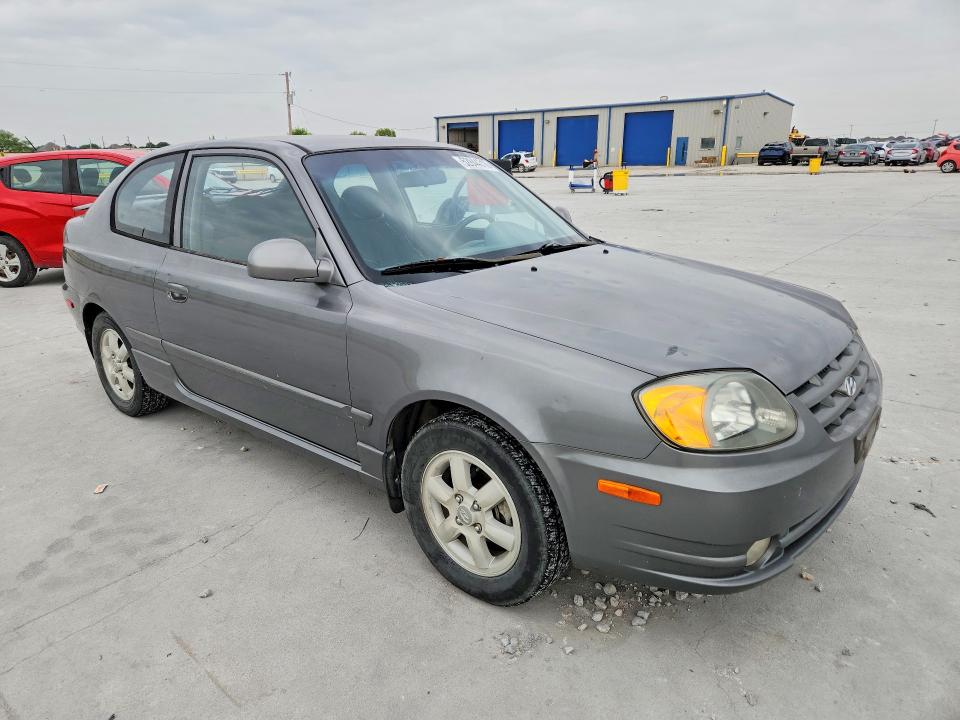 2005 Hyundai Accent VIN KMHCG35C75U322188 COPART salvage auction — HAIL, Tx - Certificate Of Title, sold $150 on 2026-07-28 (photo 4)