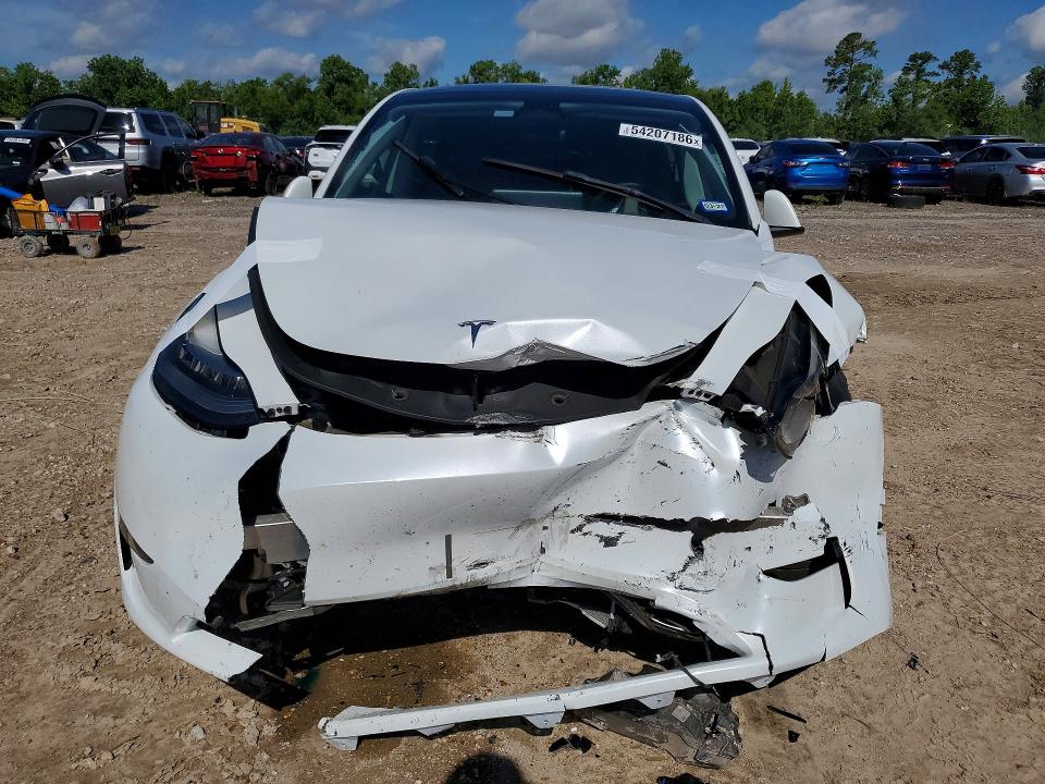 2023 Tesla VIN 7SAYGDEE0PA090319 COPART salvage auction — FRONT END, TX - SALVAGE VEHICLE TITLE, sold $8,500 on 2026-07-31 (photo 5)