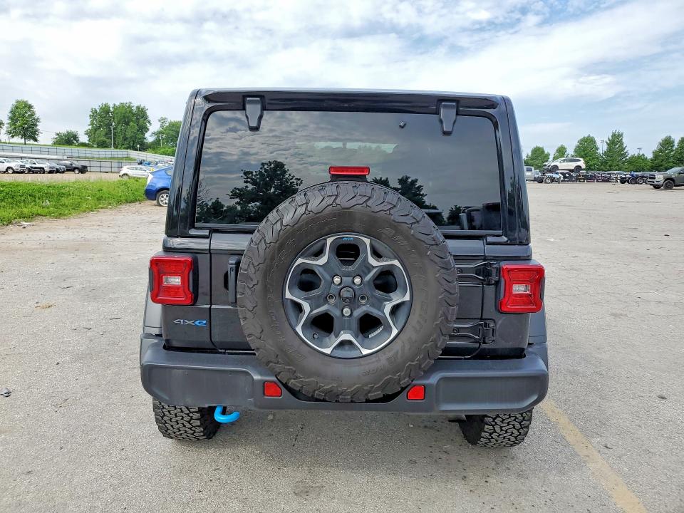 2023 Jeep Wrangler / VIN 1C4JJXR67PW518535 COPART salvage auction — MINOR DENT/SCRATCHES, Mo - Certificate Of Title, sold $24,250 on 2026-07-02 (photo 6)