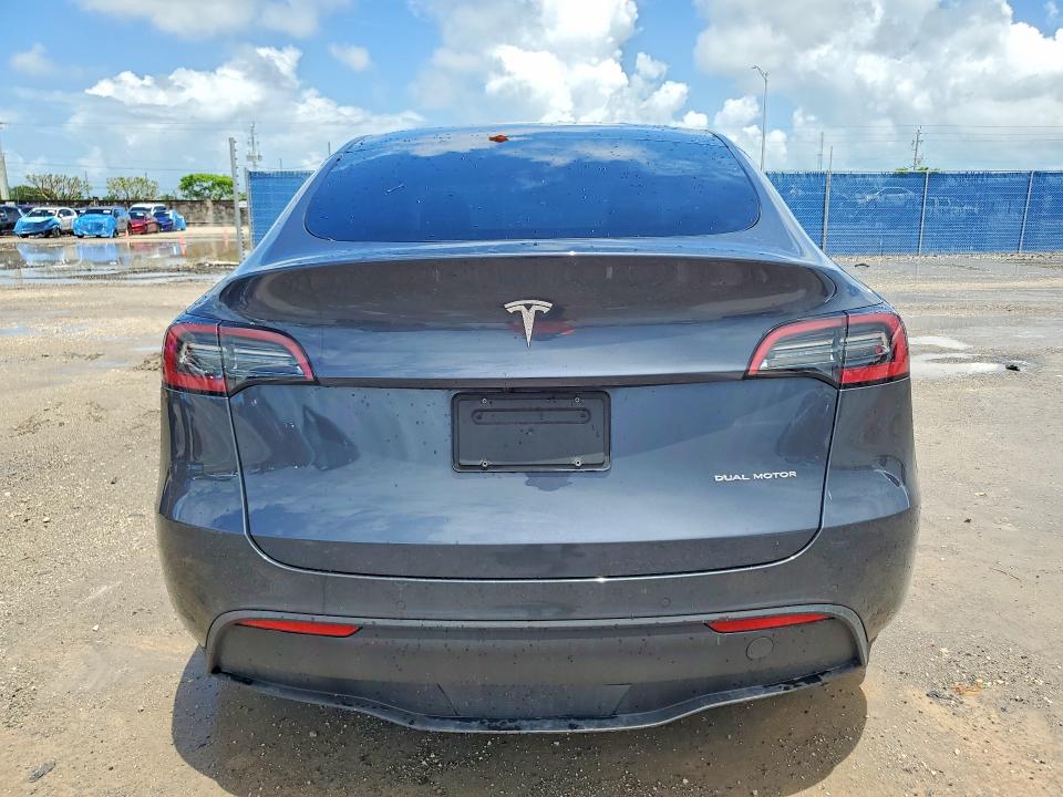 2022 Tesla Model y VIN 7SAYGDEE9NF436335 COPART salvage auction — FRONT END, Fl - Certificate Of Destruction, sold $5,600 on 2026-07-17 (photo 6)