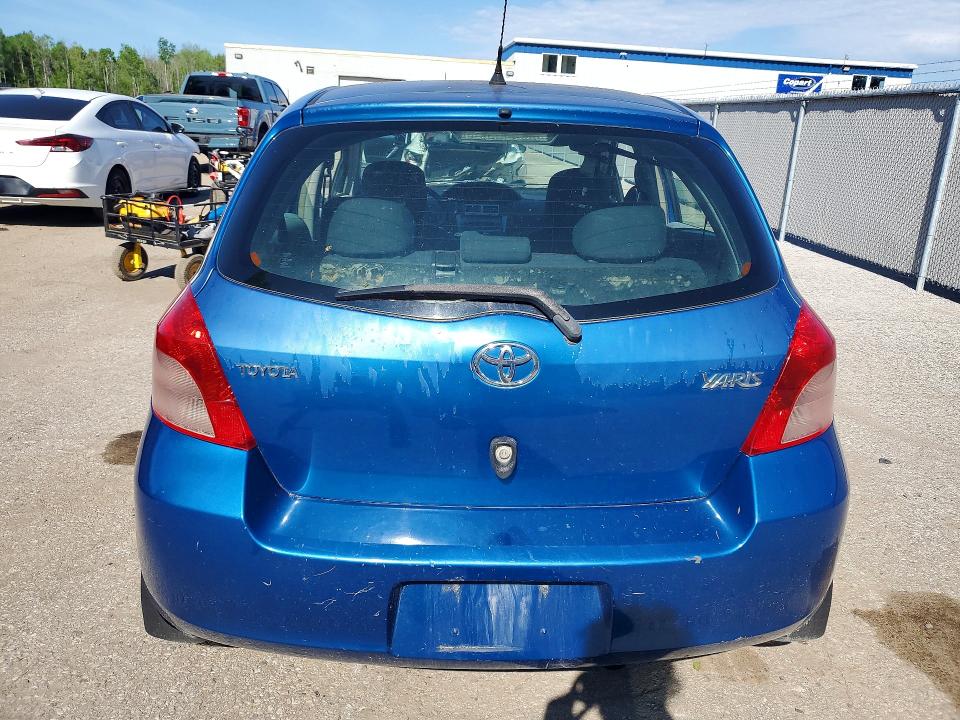 2007 Toyota Yaris VIN JTDKT923375122120 COPART salvage auction — MINOR DENT/SCRATCHES, On - Permit No Brand - Unfit, sold $800 on 2026-07-08 (photo 6)