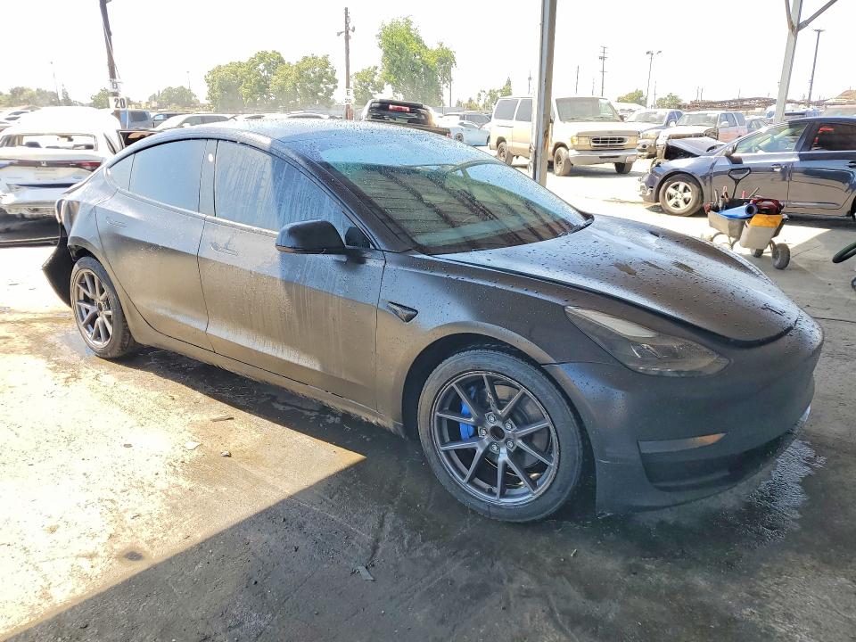 2023 Tesla Model 3 VIN 5YJ3E1EA8PF447449 COPART salvage auction — REAR END, Ca - Salvage Certificate, sold $5,200 on 2026-07-13 (photo 4)