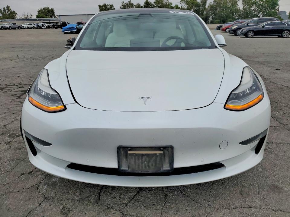 2019 Tesla Model 3 VIN 5YJ3E1EA9KF509546 COPART salvage auction — SIDE, CA - SALVAGE CERTIFICATE, sold $4,400 on 2026-07-16 (photo 5)