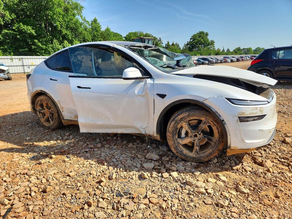 2026 Tesla VIN 7SAYGDED1TA431518 COPART salvage auction — WATER/FLOOD, Nc - Salvage Certificate Of Title, sold $1,700 on 2026-07-27 (photo 4)