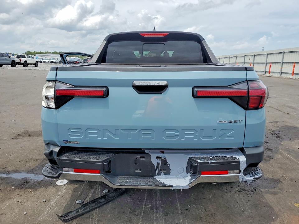 2024 Hyundai Santa cruz VIN 5NTJEDDF3RH107668 COPART salvage auction — SIDE, Salvage Title, sold $7,100 on 2026-07-20 (photo 6)