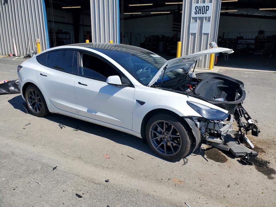 2021 Tesla VIN 5YJ3E1EAXMF874482 COPART salvage auction — FRONT END, Ca - Salvage Certificate, sold $3,750 on 2026-07-16 (photo 4)