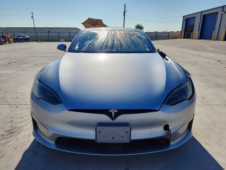 2025 Tesla Model s VIN 5YJSA1E58SF551202 COPART salvage auction — SIDE, Tx - Certificate Of Title, sold $20,300 on 2026-07-21 (photo 5)