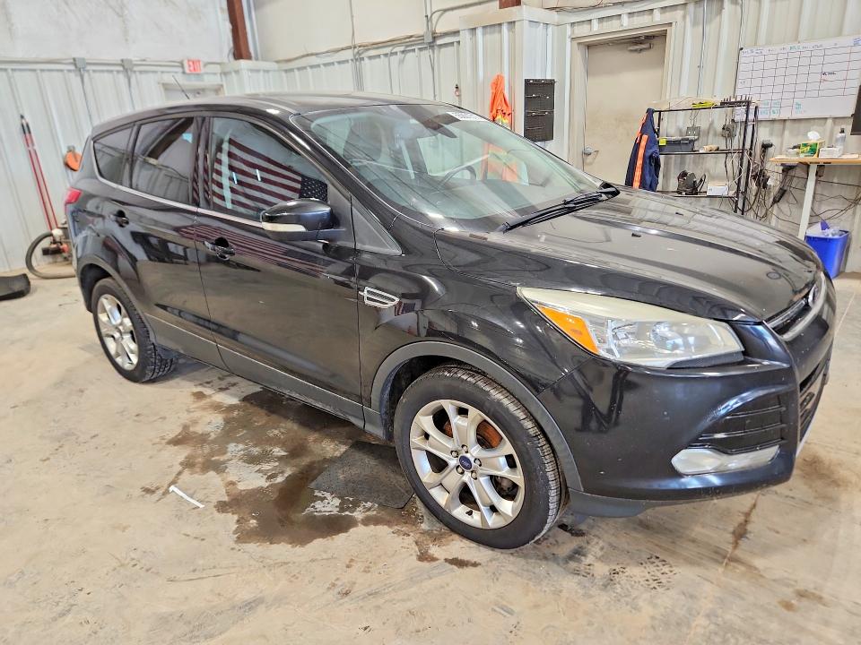 2013 Ford Escape VIN 1FMCU9HXXDUA78822 COPART salvage auction — NORMAL WEAR, Mt - Certificate Of Title, sold $325 on 2026-07-03 (photo 4)